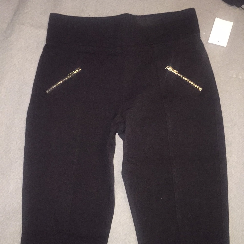 Long jegging style pants, zipper accents